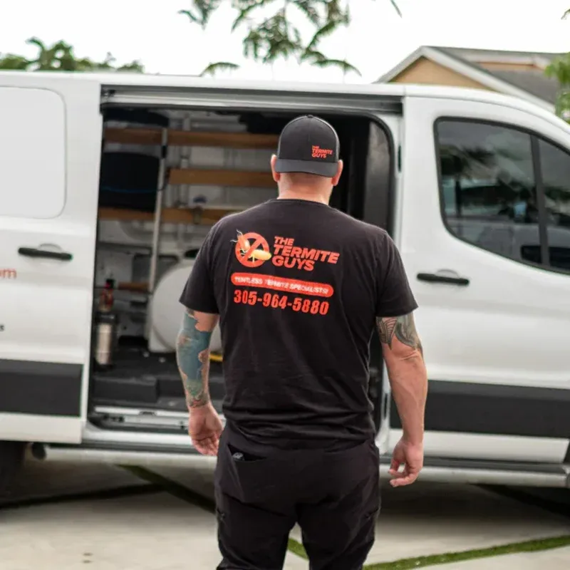 Pest control technician performing a thorough inspection of a Kendall property