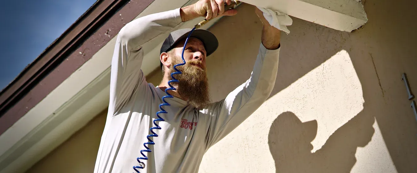 Florida Termite Guys technician conducting thorough property inspection